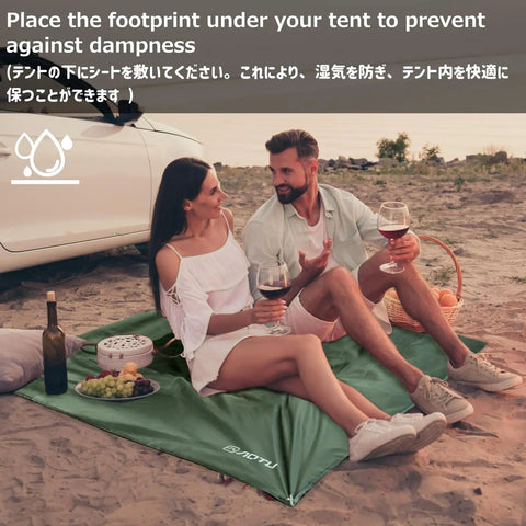 Couple sitting on Army Green Waterproof Camping Tarp Footprint Ground Cloth Shelter Rain Fly For Outdoor Gear 5x7 Ft Beach Mat.