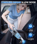Person using Cordless Handheld Vacuum With 16000 Pa Suction Rechargeable Portable Car And Home Cleaner in car seat