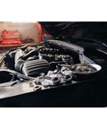 Car engine bay with 7 Piece SAE Ratcheting Wrench Set With 72 Tooth Box End 15 Degree Offset Chrome Finish tools on fender