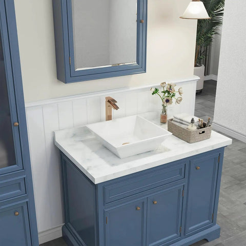 White Square Ceramic Countertop Vessel Sink For Bathroom 16 By 16 By 4.92 Inches Durable Ceramic With No Fuss Surface Mount Installation Sleek Modern Vanity Upgrade For A Fresh Look on a blue vanity cabinet.