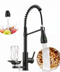 Commercial Grade Kitchen Workstation Faucet with with Glass Rinser & LED spraying water over a plate and glass for cleaning.
