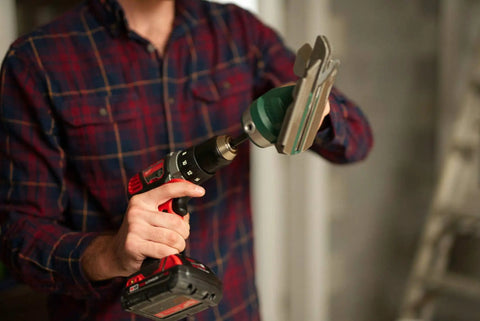 Snapper Shear Pro Drill Attachment For Fiber Cement Board Cutting HardieBacker One Quarter To One Half Inch Thick With Any 18 Volt Or Higher Cordless Drill Contractor Grade For Cutting Any Shape being attached to a black and red cordless drill