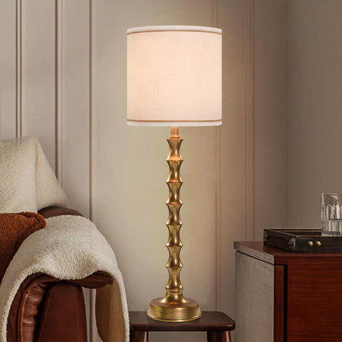 Gold Buffet Lamps Set Of 2 Tall Skinny Candlestick Style Lamps For Living Room And Dining Room on wooden table near armchair