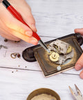 Using Drilling Cleaning Pen With Fiberglass Brush And Precision Abrasive Stick for watch gear dust removal and maintenance