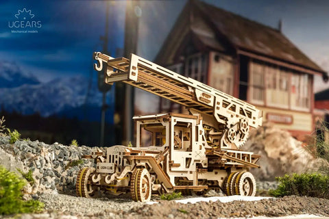 Wooden 3D Fire Truck Model Kit With Lever Operated Rotatable Retractable Ladder That Converts To A Crane Multicolor DIY Build Toy For Adults And Kids 537 Part Set, side view