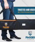 Person holding Beefy Heavy Duty Guide Rail Bag for Track Saw Guides up to 59 Inches, premium 600D polyester, water resistant.