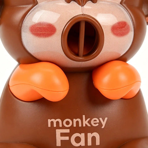 Rechargeable Usb Desktop Cooling Fan For Mugs And Bottles With Adjustable Speed Settings To Keep Coffee Tea Milk Water Frosty And Beat The Heat All Day Long, designed as a cute monkey with orange accents.