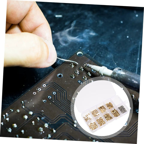 Built Different M2 Screw Assortment Kit With Nickel Plated Iron Fasteners And Copper Standoff Spacers For Heavy Duty Assembly Projects Featuring Durable Threaded Pillars In A Solid Storage Case, shown during project assembly.