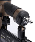 Close-up of Heavy Duty Pneumatic Brad Nailer showcasing air connector and depth adjustment features for precision carpentry.