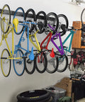 Six Bike Wall Mount Storage Rack With Interlocking Rails And Easy Snap Hooks For Indoor Garage Space Saving Vertical Bicycle Holder displaying six bikes
