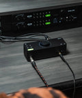 EVO 8 USB Audio Interface for Mac and Windows with 4 EVO Mic Pres JFET Instrument Input on studio desk setup.