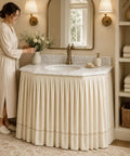 Peel And Stick Under Sink Skirt Cover In Crisp White Pleated Cotton concealing plumbing beneath a stylish sink.