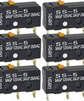 Six Pack Pin Plunger Micro Switches With SPDT N O N C High Current 5A at 125V AC or 3A at 250V AC, black housing with pins.