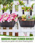 4 Pack Black Metal Hanging Flower Pots To Level Up Railing Decor Iron Planters With Drain Holes Rust Resistant Bucket Holders For Fence Balcony Yard Rock Solid Detachable Hooks. Black iron pots with vibrant flowers and succulents on a white fence.