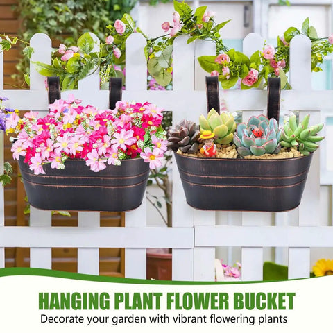 4 Pack Black Metal Hanging Flower Pots To Level Up Railing Decor Iron Planters With Drain Holes Rust Resistant Bucket Holders For Fence Balcony Yard Rock Solid Detachable Hooks. Black iron pots with vibrant flowers and succulents on a white fence.