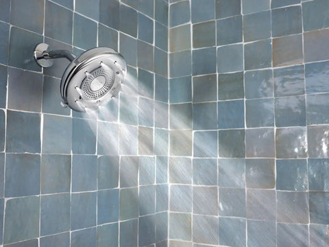 Quattro Rain Showerhead With Four Modes Relieve Soothe Clarify Cleanse For Spa Like Shower Experience While Saving Water Up To Fifty Percent Chrome Finish in use