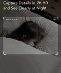 Child sleeping captured with 2K Baby Monitor With AI Motion Tracking Two Way Audio WiFi Indoor Camera in night vision mode.