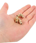 Copper Oil Nozzle Kit With 9 Pieces Straight And Angled Grease Fittings for Cars and Excavators shown in hand for size reference