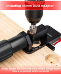 Compact Metal Concealed Hinge Jig With Quick Clamp For 35mm Cabinet Hinges, shown with dust adapter and drill in use
