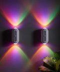 Rechargeable Motion Sensor Wall Lights Peel And Stick Sconces Set Of Two with colorful lights illuminating a wall.