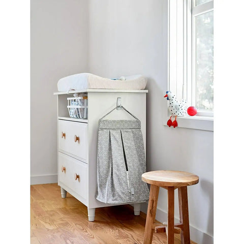 Nursery room with dresser using Large Utility Hook Mega Pack 14 Count For No Fuss Damage Free Hanging Holds Strong On Painted Walls Wood Tile And More Fast Easy To Hang Removes Cleanly Ideal For Garage Kitchen And Bathroom Organization.