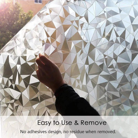 Hand applying 3D No Glue Window Privacy Film With Frosted Glass Look, Static Cling Installation, showing rhombus pattern.