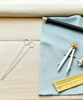 Wick Centering Tool Kit For Candle Making In Stainless Steel 20 Piece Set With Sharp Needle Point And Easy Threading Precise Centering For Aromatherapy Candles Crafting And Pro Candle Makers, with tools on fabric