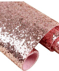 Rose Gold Chunky Glitter Self Adhesive Peel And Stick Wallpaper, rolled view, sparkly real glitter on firm nonwoven backing.