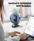 Clip On Battery Operated Fan USB Rechargeable Mini Personal Cooler with 360 degree rotation, placed on a desk next to a laptop.