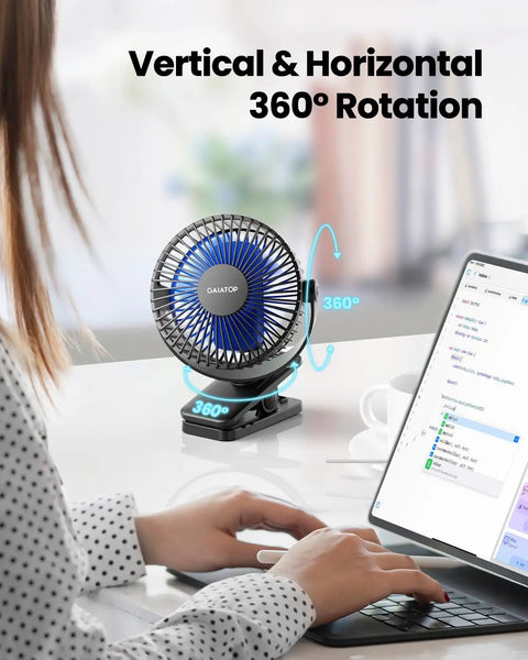 Clip On Battery Operated Fan USB Rechargeable Mini Personal Cooler with 360 degree rotation, placed on a desk next to a laptop.