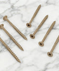 Pro Grade #8 X 2 Inch Deck Screws 100 Pack Exterior Wood Screws Bronze epoxy finish displayed on marble surface.