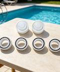 Roller Bearing Guide Kit RCX26000 RCX26001 For TigerShark Robotic Pool Cleaner DIY Friendly Pro Grade Replacement Kit Includes One RCX26001 Bearing And Two RCX26000 Bearings For Smooth Wheel Rotation And Stable Tracking. Pool cleaner bearings on patio by swimming pool