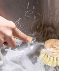 Bamboo dish brush set with handle plus 4 replacement heads used for scrubbing kitchen sink with compostable sisal bristles
