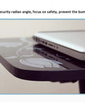 Smooth Operator Height Adjusting Overbed Table Rolling Desktop Stand Up Computer Workstation close-up of safety edge with laptop.
