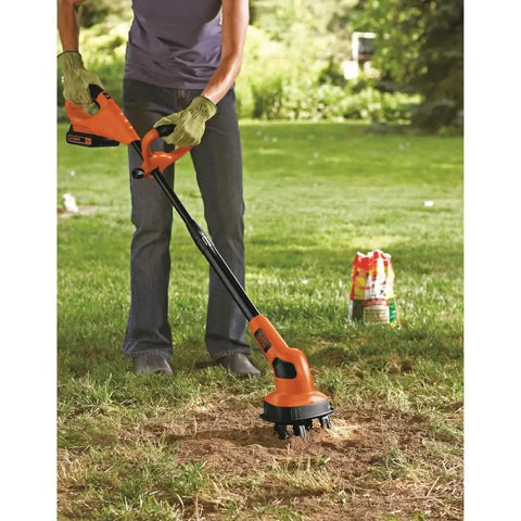 Person using 20V Max Cordless Garden Tiller Kit PowerConnect Tool Only With Dual Tines on lawn