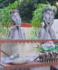 Cool Modern Impressionist Face Planter Pot For Indoor Outdoor Use with hand-painted sage green floral crown on display
