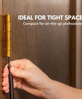 No Sweat Door Hinge Pin Remover And Install Set with hand using spring punch on a door hinge in tight space.