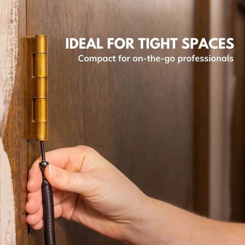 No Sweat Door Hinge Pin Remover And Install Set with hand using spring punch on a door hinge in tight space.