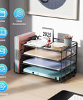 Black desk organizer with 4 tiers and magazine holder, storing A4 papers and office accessories, placed on a desk.