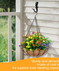 Hella Sturdy Mermaid Cast Iron Hooks, Rustic Black Wall Plant Hangers For Cozy Spaces, heavy-duty hook holding vibrant flower basket.