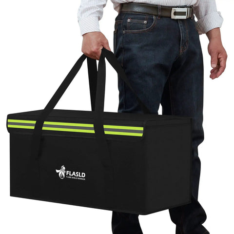 Heavy Duty Fireproof Lithium Battery Safe For 200 Ah E Bike Packs with handles being carried, black with reflective stripes.