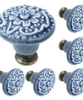 Slick Light Blue Ceramic Cabinet Knobs Six Pack For Kitchen Drawers And Cupboards Dreamy Matte Finish with floral design.