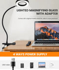 10X Lighted Magnifying Glass With LED Clip On Reading Lamp for Desk Bed and Nail Art next to a laptop on a desk
