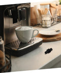 Insulated Rubber Steam Wand Sleeve for Camping Coffee Makers and Espresso Gadgets beside coffee machine