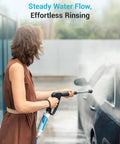 Person using Inline Water Filter Kit For Car Wash And Window Cleaning Pack Of 2 With Pro Grade Multi Stage Filtration on car