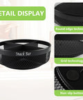 Front view of Xbopetda round black metal snack organizer with four compartments on countertop