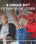 A Unique Gift for Every Special Occasion, person holding a wrapped present with red bow in living room.