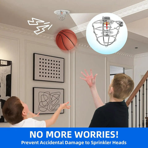 Five Pack Heavy Duty Half Or Three Quarter Inch Fire Sprinkler Head Guard Cage Protector Cover With Hella Rugged Zinc Steel Bracket positioned above kids playing with a basketball, showcasing impact protection.