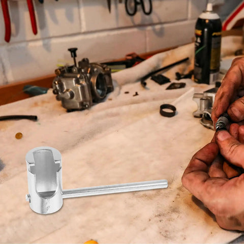 Heavy Duty Universal Fire Sprinkler Wrench Tool Rock Solid Metal Spanner on workbench, tools and hands adjusting parts.