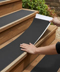 Applying Clear Stair Tread Tape 30 Inches By 4 Inches Non Slip Indoor Outdoor Adhesive Strips With Roller for stair grip.